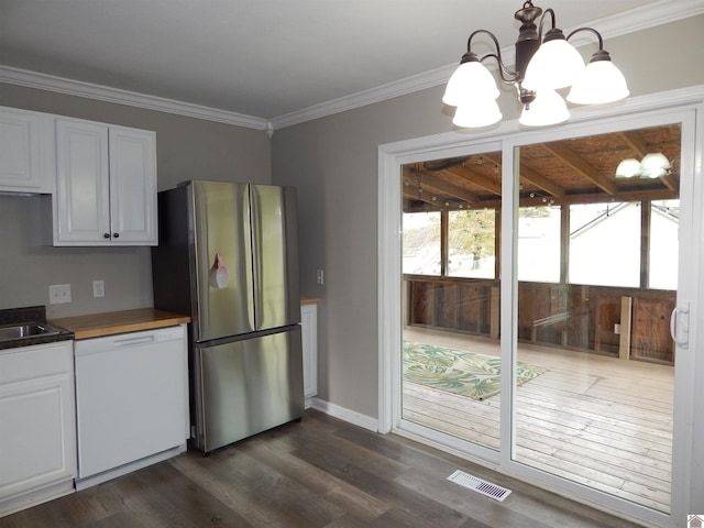 kitchen featuring dishwasher, white cabinets, stainless steel refrigerator, and dark hardwood / wood-style floors