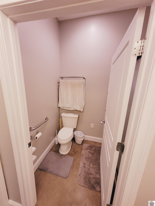 bathroom featuring toilet