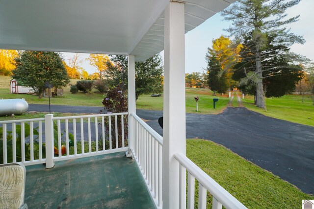 balcony featuring a porch