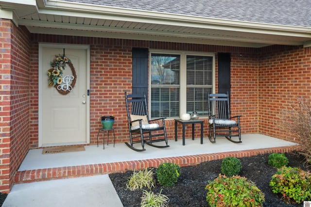 doorway to property featuring a porch