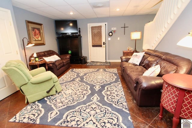 living room with dark tile patterned floors