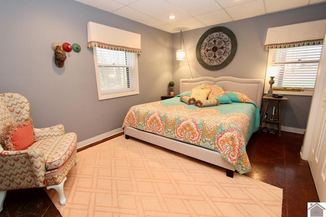 bedroom with a drop ceiling