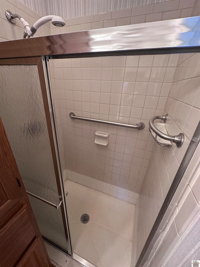 bathroom with an enclosed shower