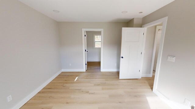 unfurnished bedroom with light hardwood / wood-style floors