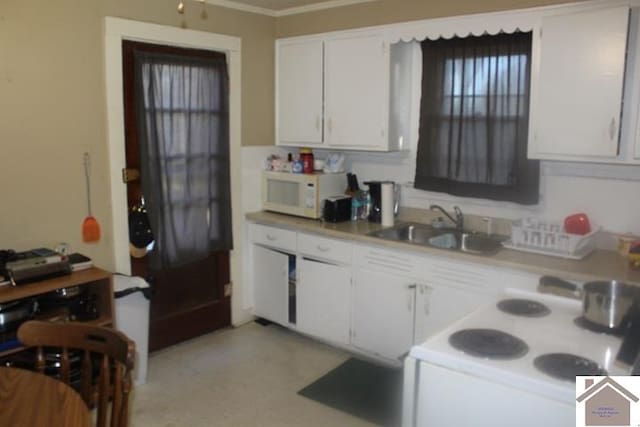 kitchen with white appliances, white cabinetry, ornamental molding, and sink