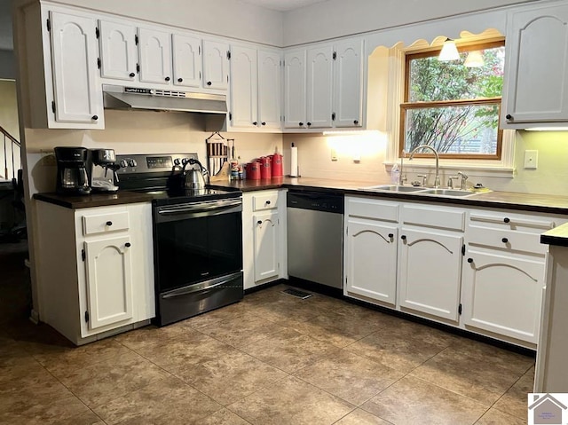 kitchen featuring white cabinetry, sink, and appliances with stainless steel finishes