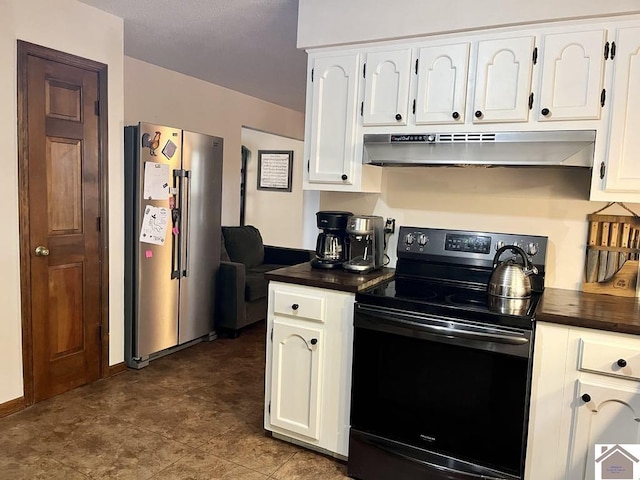 kitchen with white cabinetry, stainless steel refrigerator, and black range with electric stovetop