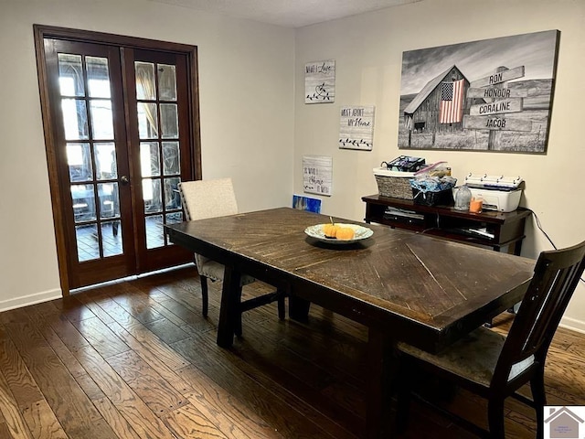 dining room featuring dark hardwood / wood-style flooring and french doors