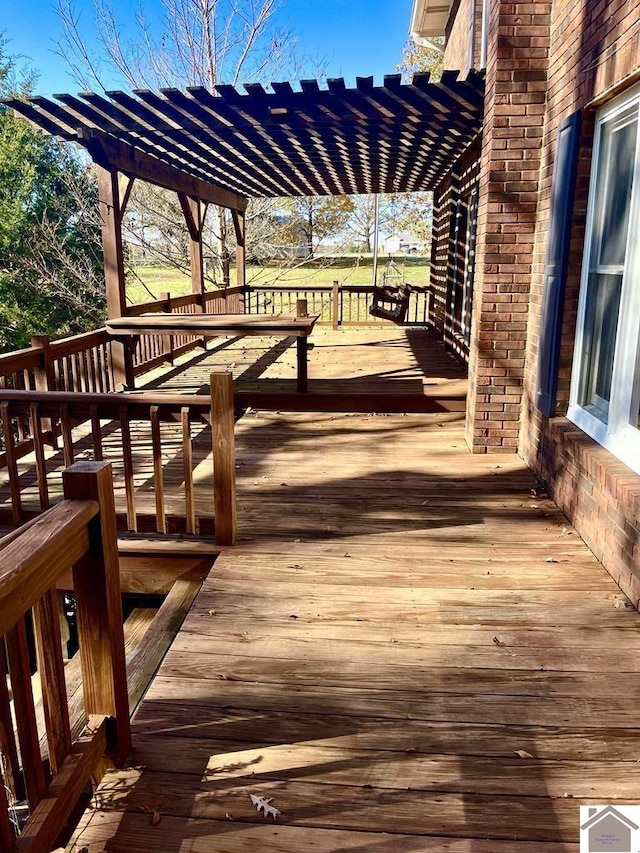 wooden deck with a pergola