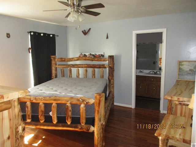 bedroom with ensuite bathroom, ceiling fan, and dark hardwood / wood-style flooring