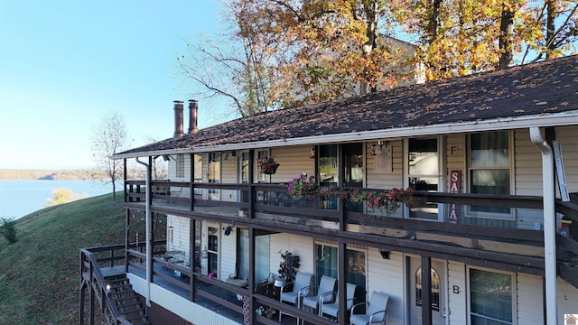 exterior space with a water view