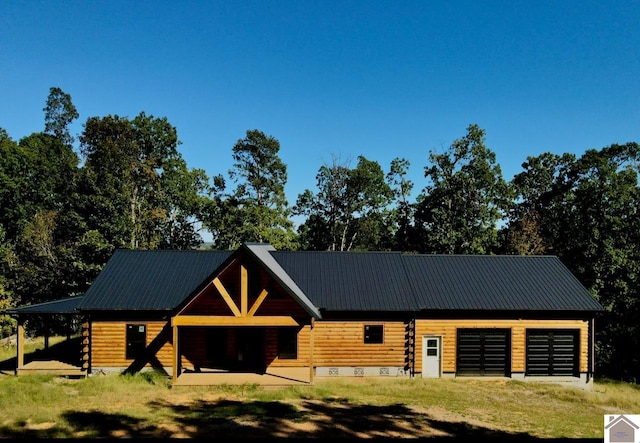 view of log cabin