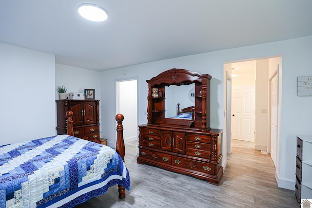 bedroom with light hardwood / wood-style floors