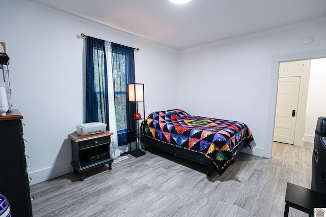 bedroom featuring light hardwood / wood-style floors