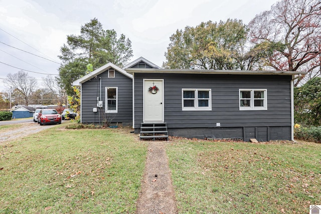 view of front of home with a front lawn