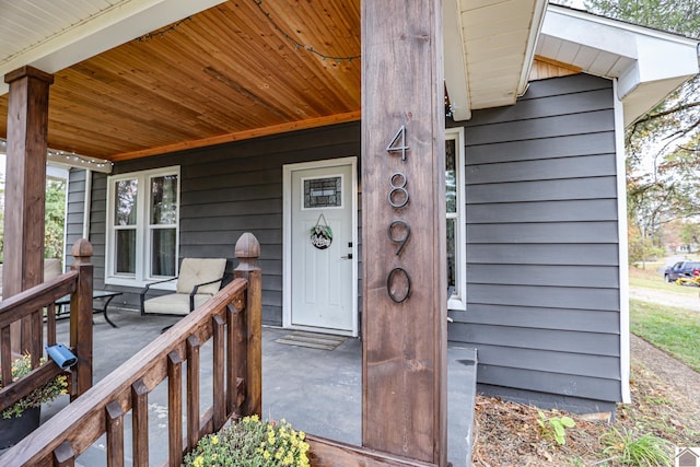 doorway to property with covered porch