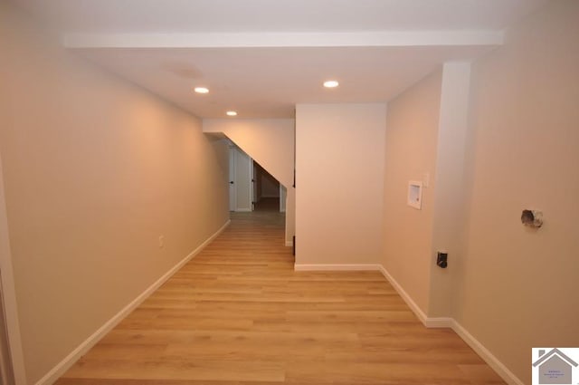 corridor featuring light hardwood / wood-style floors