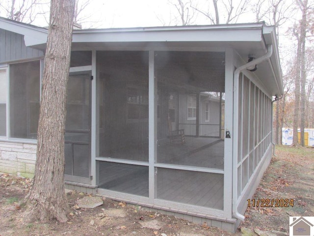 exterior space with a sunroom