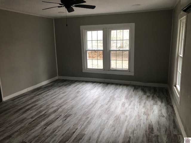 unfurnished room featuring hardwood / wood-style floors, ceiling fan, and ornamental molding