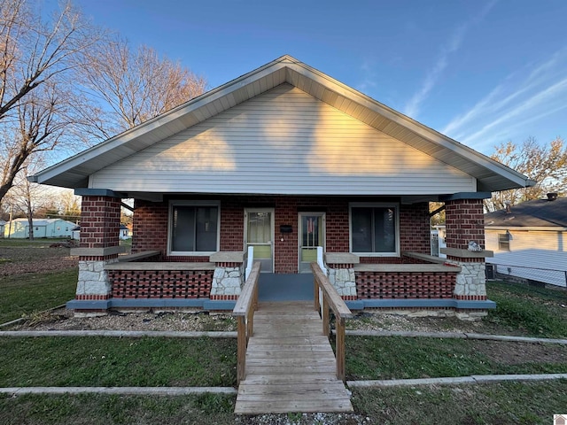 bungalow-style house with covered porch