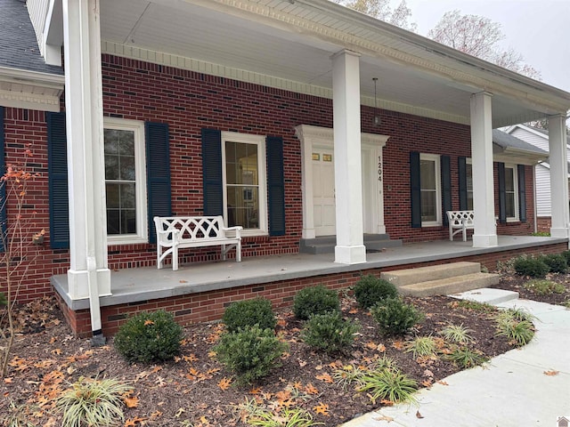 doorway to property with covered porch