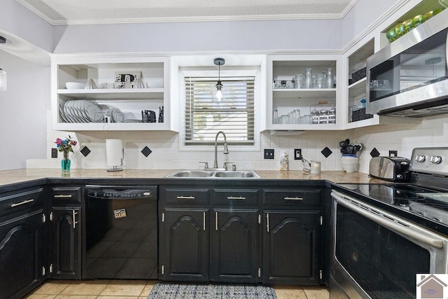 kitchen with sink, light tile patterned floors, stainless steel appliances, and ornamental molding