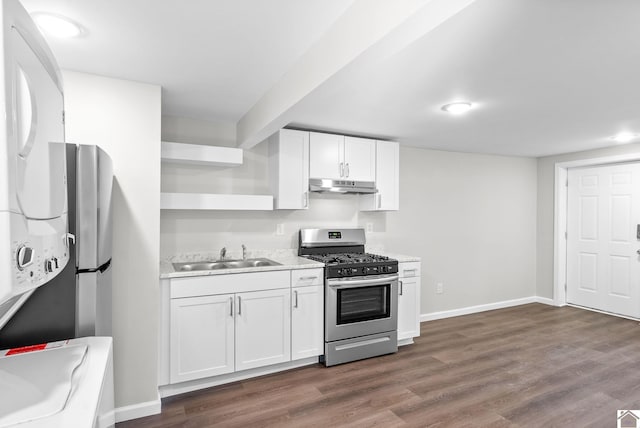 kitchen with white cabinets, stainless steel gas stove, dark hardwood / wood-style floors, and sink