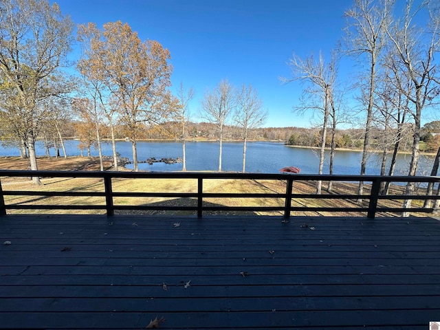 wooden terrace with a water view