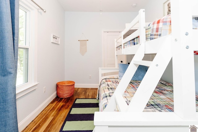 bedroom with wood-type flooring