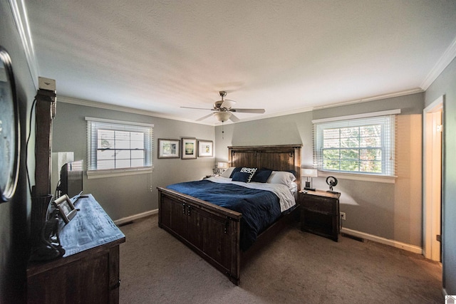 bedroom with ceiling fan, ornamental molding, a textured ceiling, and dark colored carpet