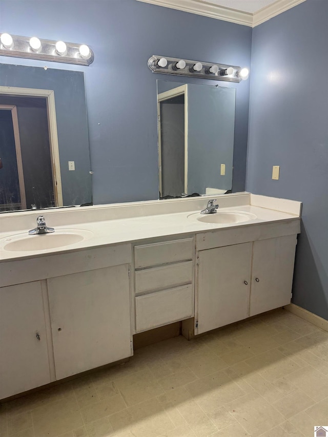 bathroom with vanity and crown molding