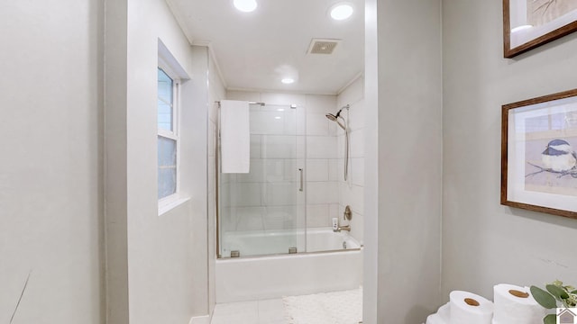 bathroom featuring enclosed tub / shower combo