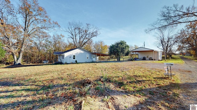 view of yard with a carport