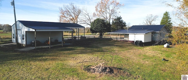 view of yard featuring a carport