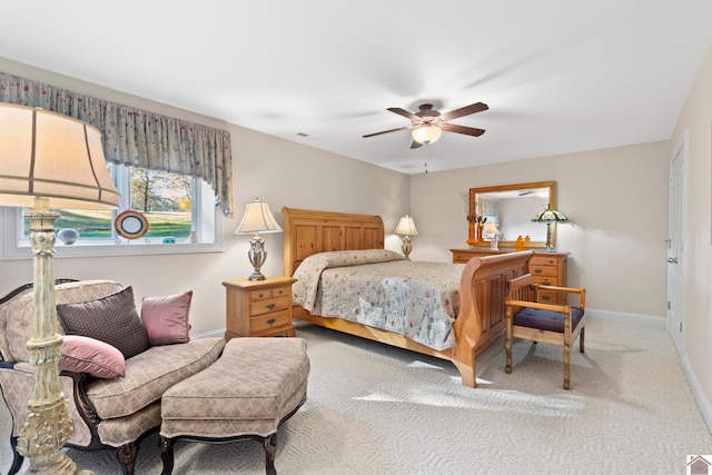 bedroom featuring ceiling fan and carpet floors