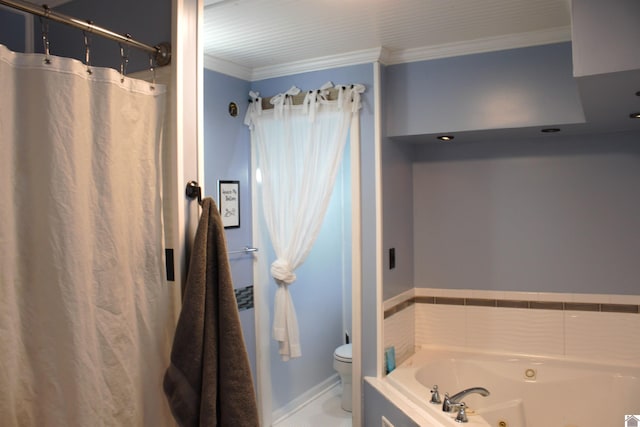 bathroom featuring toilet, ornamental molding, and separate shower and tub