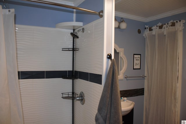 bathroom with curtained shower and ornamental molding