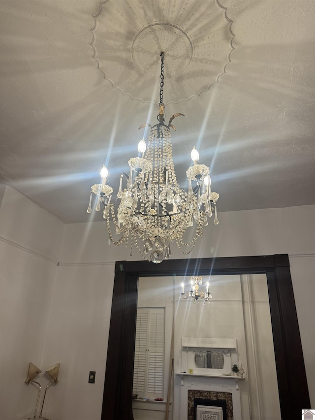 interior details featuring a notable chandelier