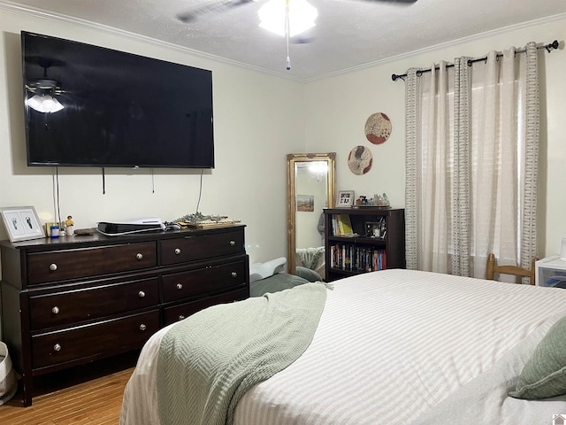 210 Banberry Bnd, Paducah, KY 42001 - bedroom with ceiling fan, ornamental molding, a textured ceiling, and light hardwood / wood-style flooring