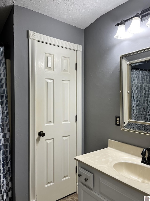210 Banberry Bnd, Paducah, KY 42001 - bathroom featuring vanity and a textured ceiling
