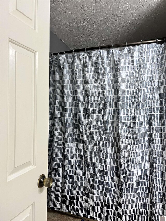 210 Banberry Bnd, Paducah, KY 42001 - room details with a textured ceiling and walk in shower
