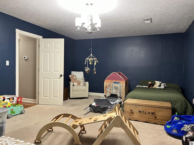 210 Banberry Bnd, Paducah, KY 42001 - bedroom featuring carpet flooring, a notable chandelier, and a textured ceiling