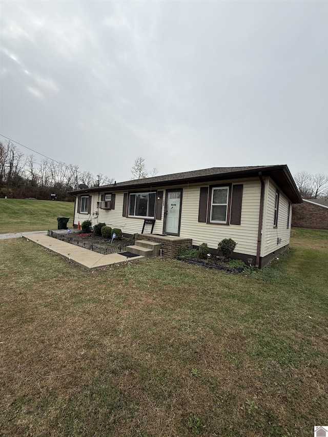 single story home featuring a patio and a front yard