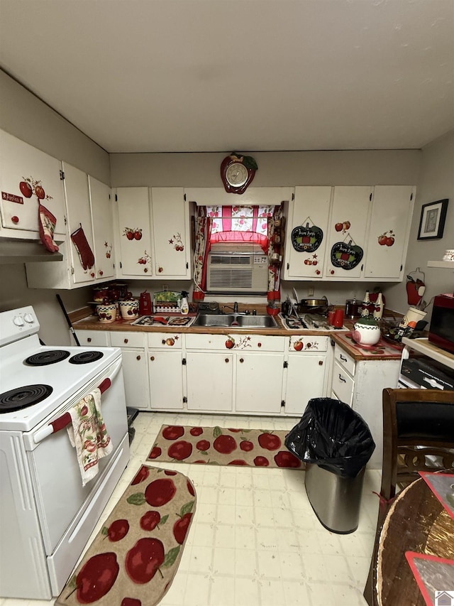 kitchen with white cabinetry, white electric range, sink, and cooling unit