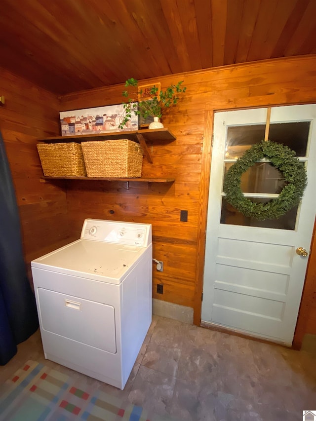 washroom with washer / dryer, wooden walls, and wooden ceiling