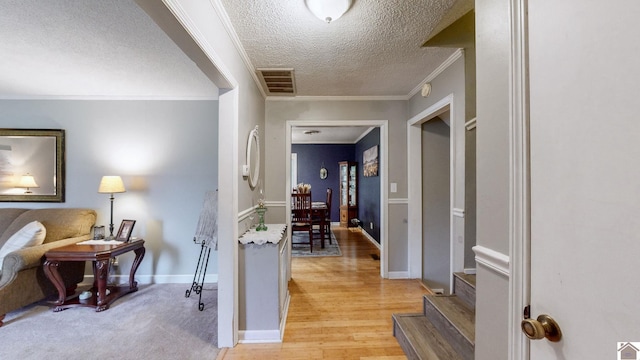 155 County Line Rd, Paducah, KY 42003 - corridor with a textured ceiling, crown molding, and light wood finished floors