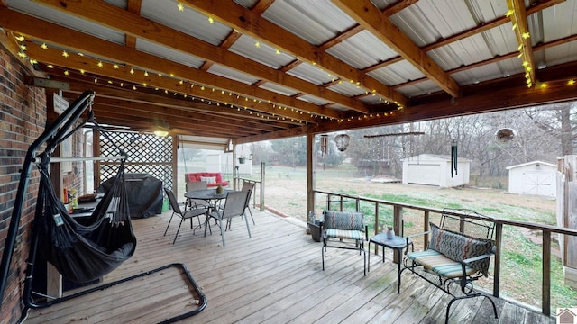 155 County Line Rd, Paducah, KY 42003 - wooden deck featuring a storage unit, outdoor dining area, and area for grilling