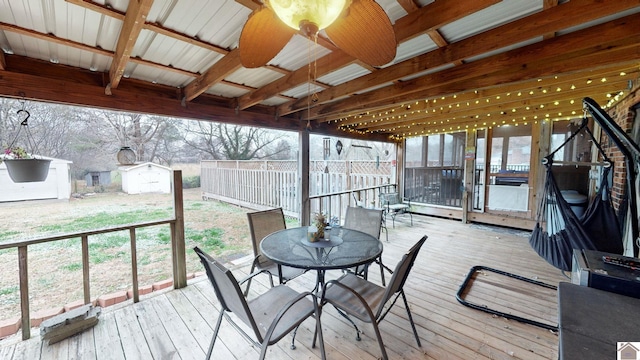 155 County Line Rd, Paducah, KY 42003 - wooden deck with outdoor dining area and a storage shed