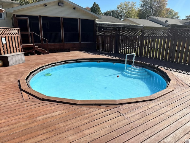 155 County Line Rd, Paducah, KY 42003 - view of swimming pool with a sunroom and a wooden deck