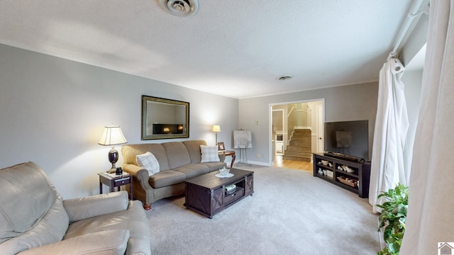 155 County Line Rd, Paducah, KY 42003 - living room featuring light carpet, stairs, and ornamental molding